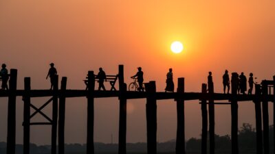 A sunset over a wharf in Myanmar