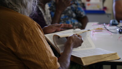 Indigenous woman reading the Bible